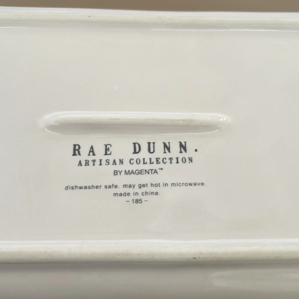 Rae Dunn White Vanity Tray Love Design can be used as a tray for food.